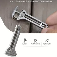 Compact Keychain Multitool. Portable Small stainless steel survival gear with cutter, screwdriver, and opener for camping and daily use.