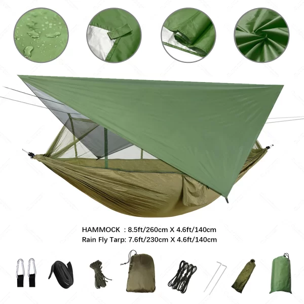 Army green stealth camping hammock set up on a white background with a green tarp above it.