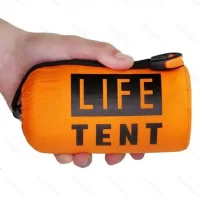 Orange Emergency Survival Bivy Bag stored in pouch, in a mans hand.